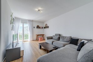 Spacious living room with city view