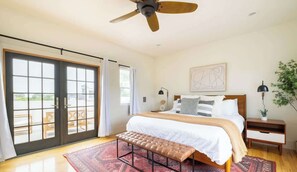 Relax in style within the master bedroom on the luxe king bed
