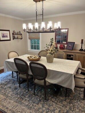 Formal dining room connected to living room.large