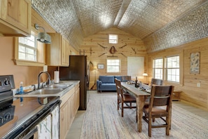 Dining Area & Kitchen | Serenity | 1st Level | Window & Wall A/C Units