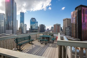 Unwind with sunset views and fresh air on the rooftop deck—perfect for photos!