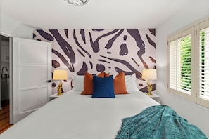 King-size comfort with plush pillows and sheets.