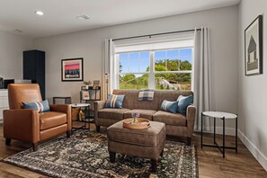 Recliner and large sofa with ottoman for relaxing. 