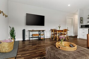 Eating area, larger screen tv, desk, outdoor blankets for the firepit or patio.