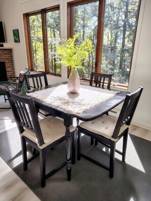 Sun-filled Dining Area overlooking the woods