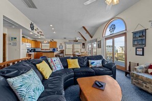 Top-Level Living Room with Deck Access