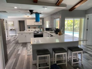 View to kitchen and dining room from living room