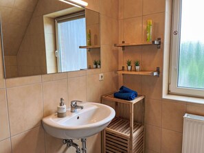 Flooring, Plumbing Fixture, Interior Design, Wood, Bathroom Sink, Floor, Sink, Bathroom, Furniture, Tap