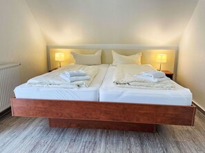 Bedroom, Bed, Wood, Floor, Flooring, Bed Sheet, Interior Design, Bedding, Furniture, Throw Pillow
