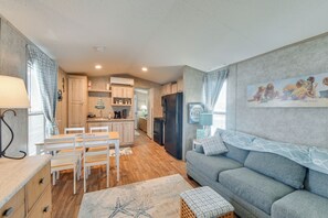 Living Room | Single-Story Stilted Home | Queen Sleeper Sofa | Smart TV