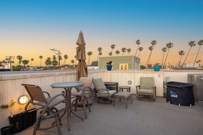 Perfect for dining or unwinding with ocean breezes and sunset skies.