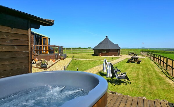 Wood-fired hot tub included
