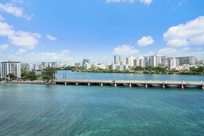 Breathtaking panoramic views of the glistening Condado Lagoon and San Juan's dynamic skyline.