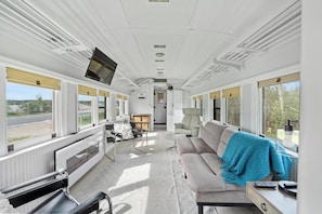 living area with an electric fireplace