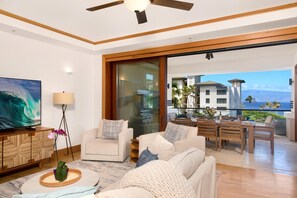 Hale-Honu-At-Montage-Kapalua-Bay With soft hues, plush seating, and the sea sparkling beyond the glass, this living room redefines relaxation
