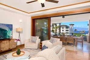 Hale-Honu-At-Montage-Kapalua-Bay With soft hues, plush seating, and the sea sparkling beyond the glass, this living room redefines relaxation