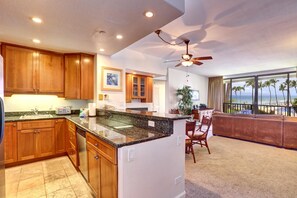 KS-258 Granite glows, cabinets gleam, and fans spin softly?this warm kitchen is ready for flavors, stories, and sunshine