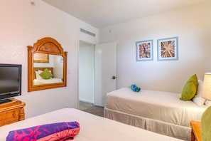 KS-258 A playful twin retreat with mirrored charm, pops of color, lanai breezes, and a closet that?s ready for aloha : Master Bedroom