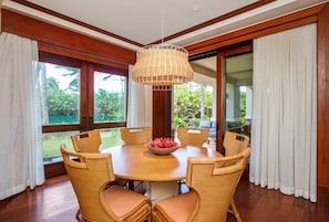 Hale Mala-At-Montage-Kapalua-Bay Gather your crew at this roundtable of sunshine where rattan royalty dine under a chandelier that dreams of the beach