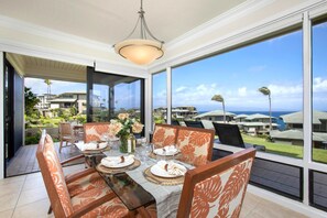 KBV-31G4 This isn?t your average dining room?it?s an open-air daydream with ocean glimmers, floral vibes, and serious tropical energy