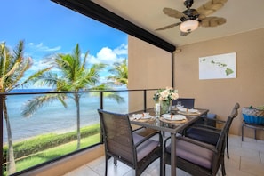 MAH-301 Glass railings frame a view so divine, it feels like you?re dining inside a live-action painting of paradise