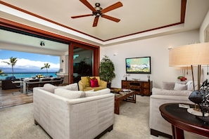 Hale-Moana-At-Montage-Kapalua-Bay Spacious living room with full ocean views opens directly onto the lanai
