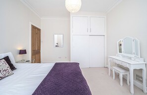 Master bedroom with lots of storage.