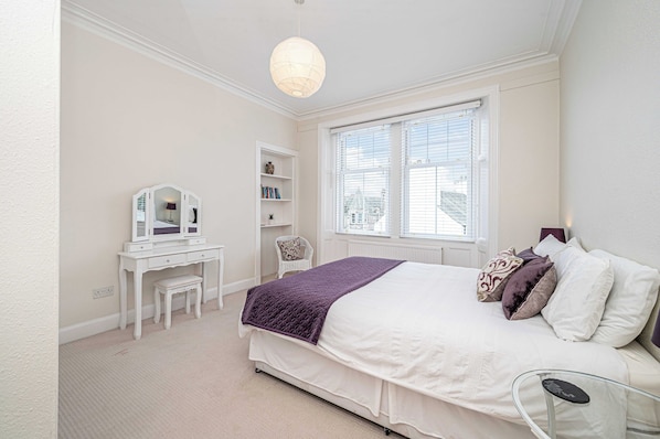 Master bedroom set up with king-size bed. Can also be changed into 2 singles.