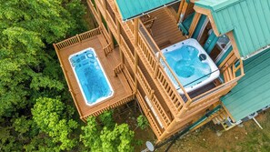 Enjoy the heated 20' SwimSpa on the entertainment deck and a hottub on the 3rd deck while enjoying the view of the Smokies.