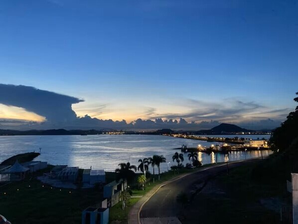 Sunset view of the Panamerican Bridge over the Panama Canal.