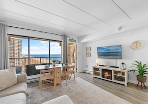 View of living space / balcony with foldable dining table setup