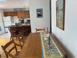Table for four next to breakfast bar for two.