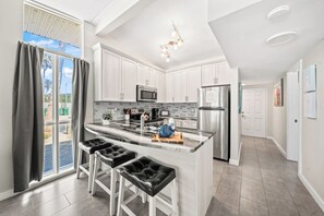 Clean & modern kitchen design with stainless appliances