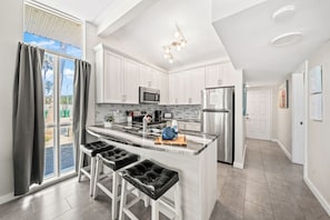 Clean & modern kitchen design with stainless appliances