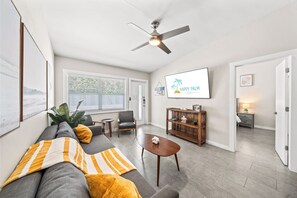 Spacious hangout with smart TV and comfy couches