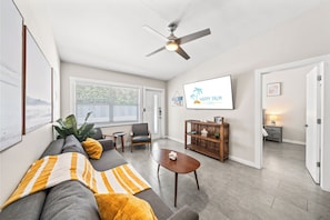 Spacious hangout with smart TV and comfy couches
