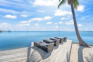 Bask on the sunbeds with a stunning Banana River view