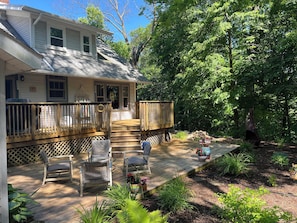 Twin level decks in back overlooking secluded garden.