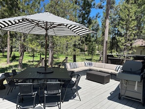 Resort style back deck with luxury seating, amenities and BBQ.