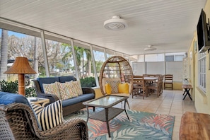 Screened lanai with Smart TV and large dining
