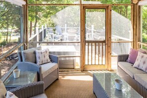Relax your mornings away with coffee and the cool breeze from the screened-in porch.
