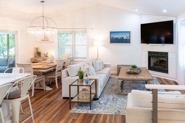 Gorgeous and cozy open living space perfect for gathering together and enjoying the coastal lifestyle.