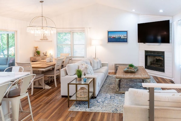 Gorgeous and cozy open living space perfect for gathering together and enjoying the coastal lifestyle.