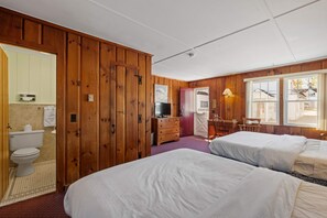 Wake up to natural light and small-town charm in this cozy room with private entry and space to relax or get some work done.