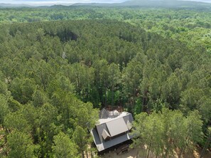 This birds' eye view showcases the beautiful landscape of the property