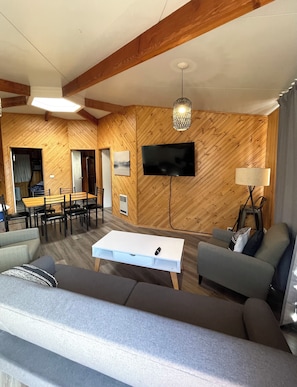 Cozy living room with smart TV and a view
