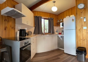A fully equipped with everything you need to cook and enjoy your meals
