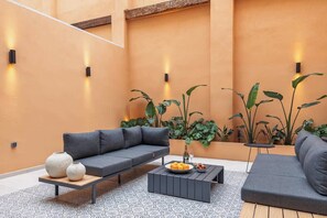 30sqm private patio with space to relax after exploring the city.