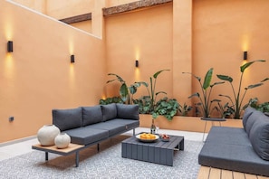 30sqm private patio with space to relax after exploring the city.