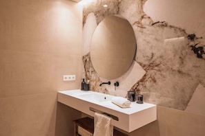 Bathroom with quality finishes and essential amenities.